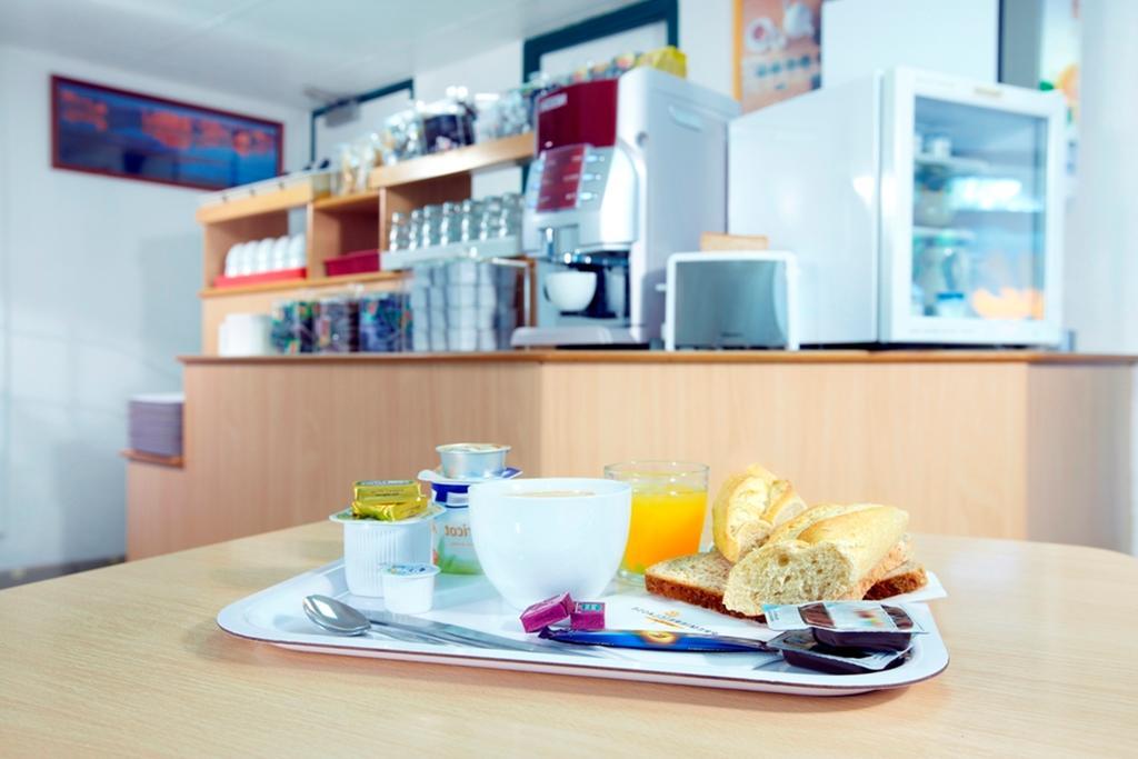 Premiere Classe Evreux Exterior photo A typical breakfast