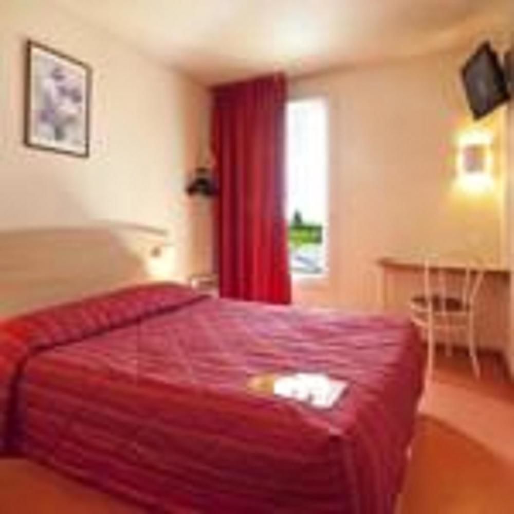Premiere Classe Evreux Exterior photo A typical room at a hotel