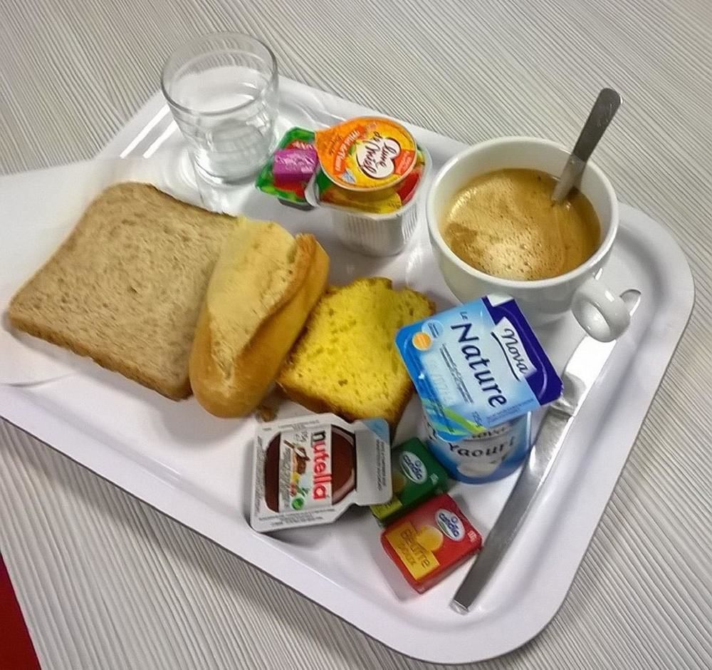 Premiere Classe Evreux Exterior photo A typical breakfast in France