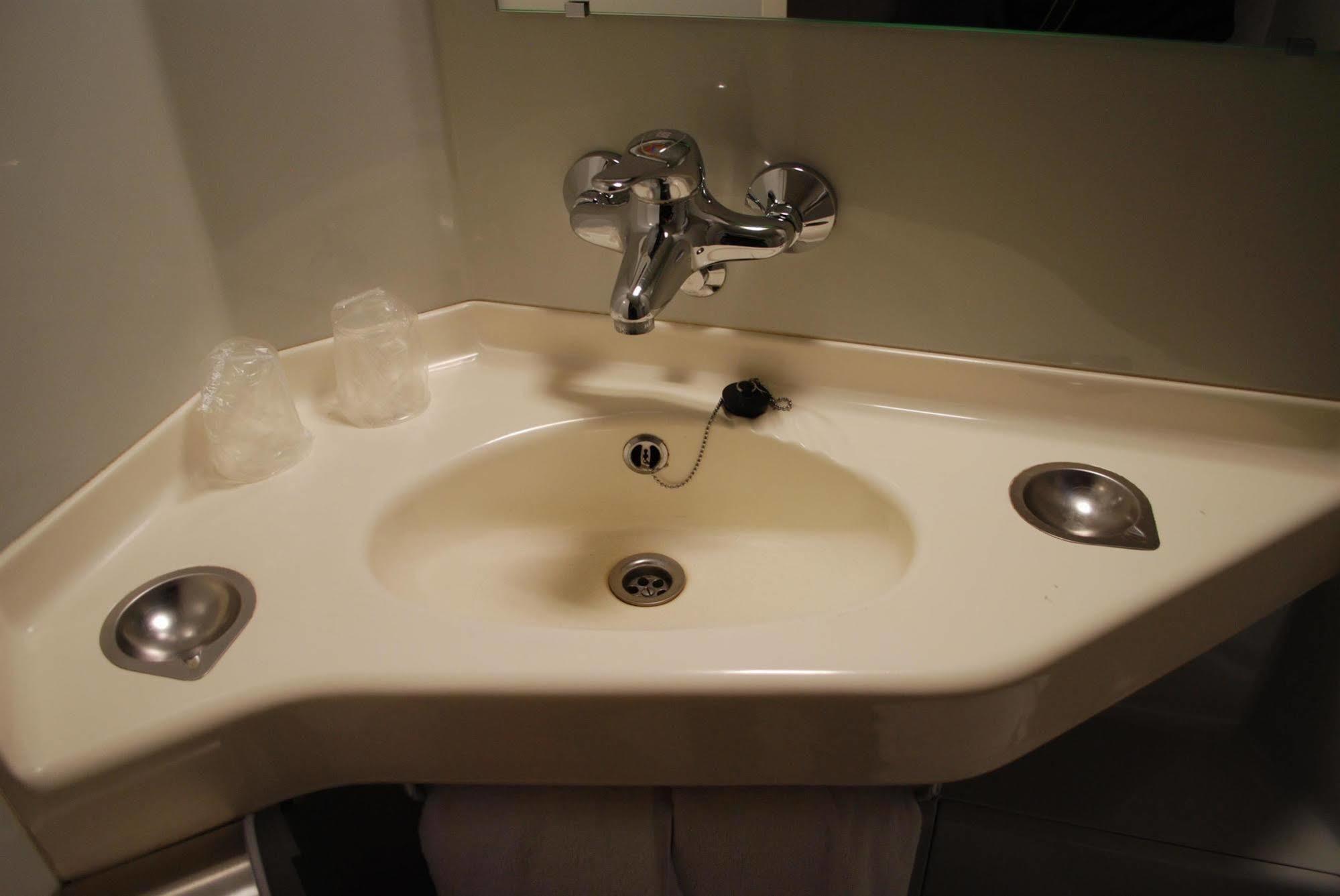 Premiere Classe Evreux Exterior photo A typical lavatory